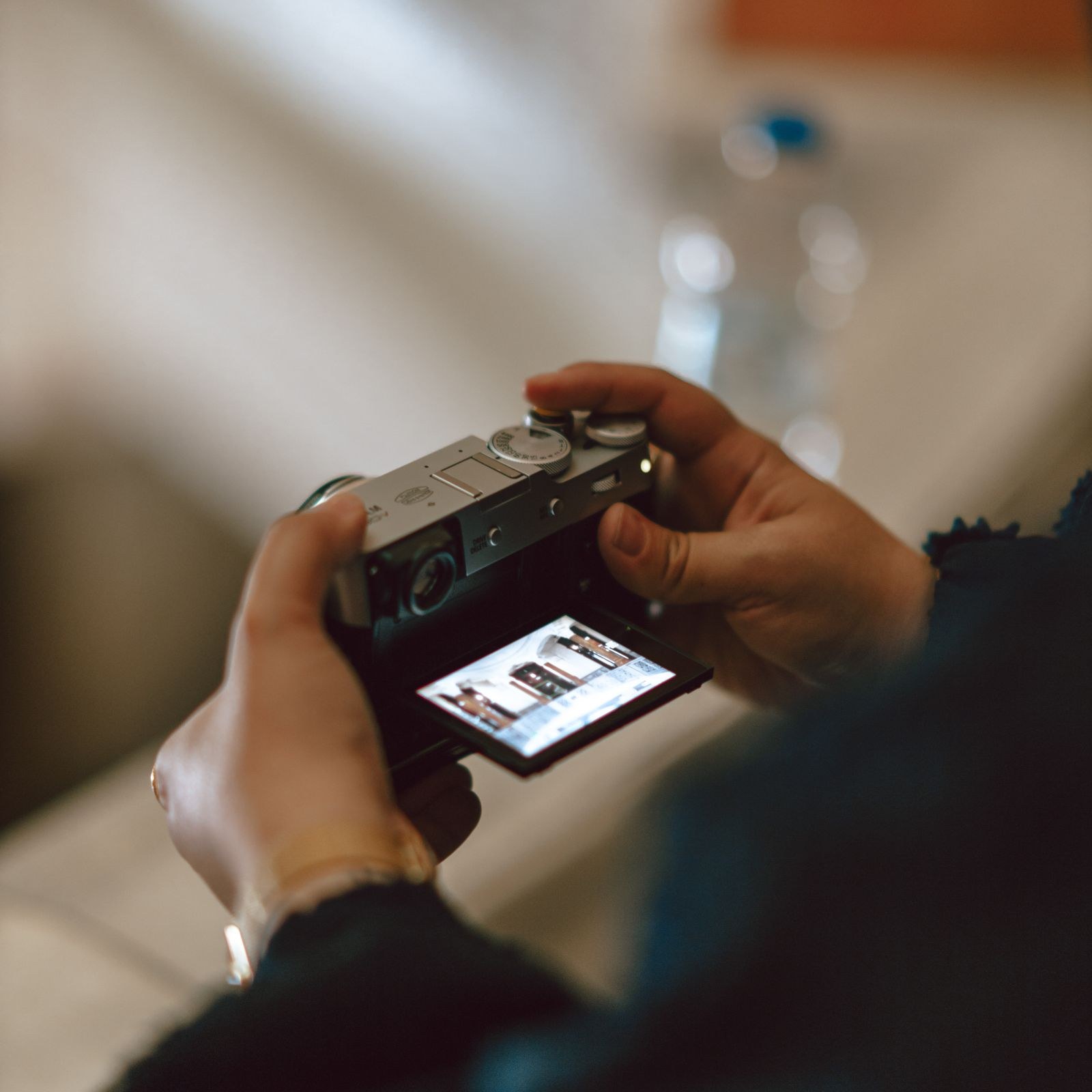 Editor framing a shot with a camera on location