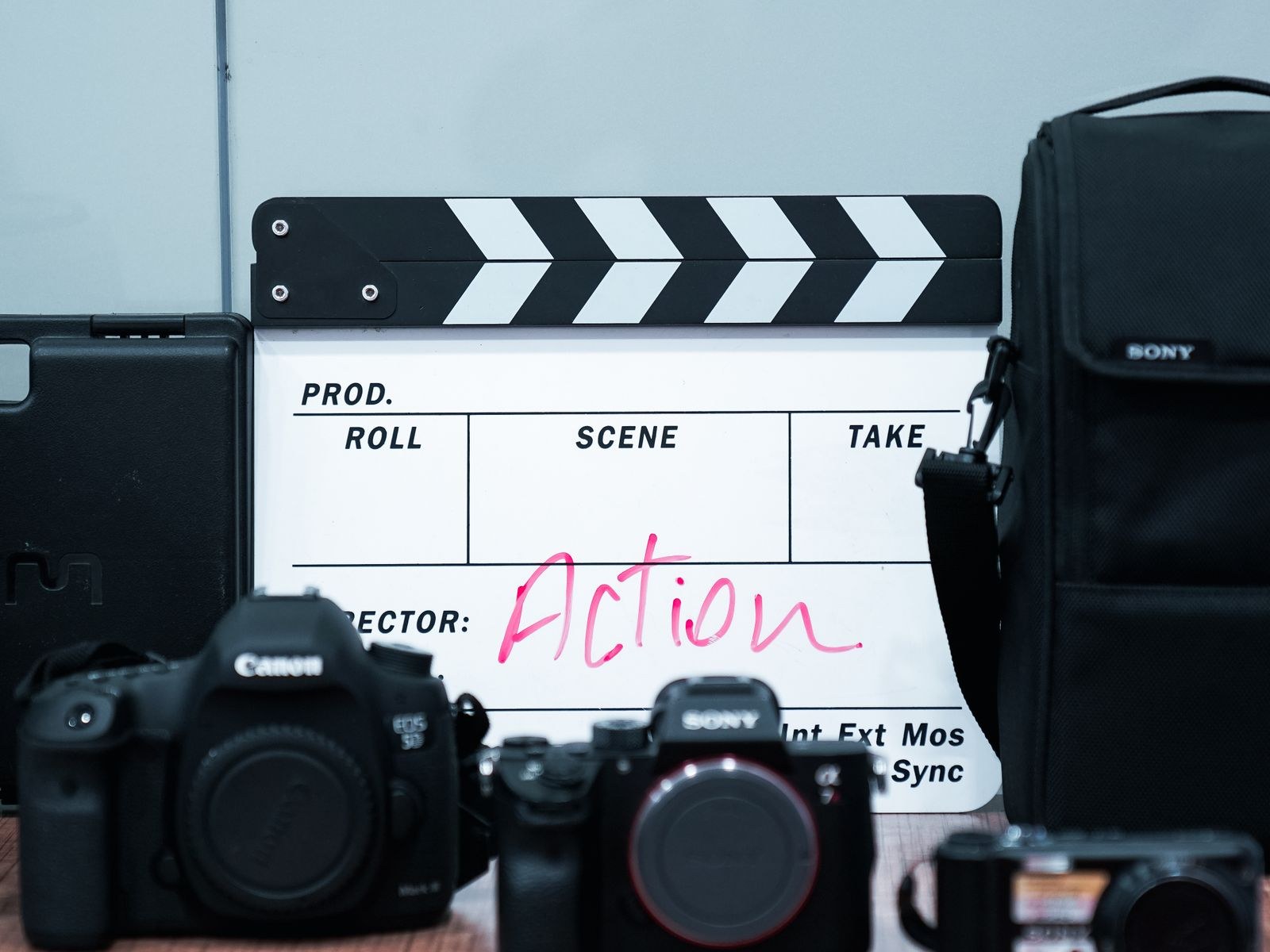 Camera and clapperboard on a film set